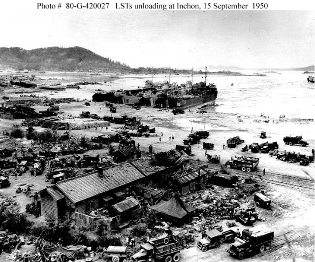 Landing Ship Tanks unload personnel and equipment on Red Beach one day after the amphibious landings on Inchon, Korea, Sept. 15, 1950, during the Korean War. 