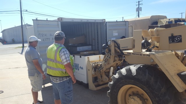 Sierra Army Depot materiel examiner and identifiers pack and ship 11-containers of aviation repair parts worth $19.5 million and an additional 50-containers of tracked and wheeled vehicle parts April 7, 2017, Fort Hood, Texas. 