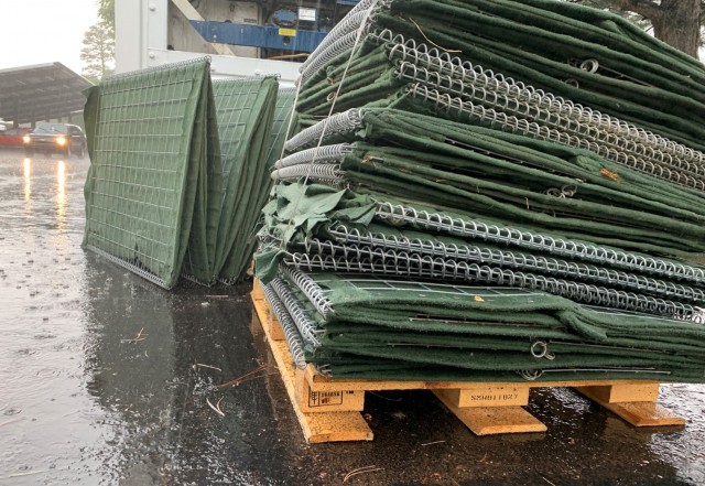 The U.S. Army Corps of Engineers Los Angeles District transfers HESCO barriers to Coconino County to support the county’s emergency flood response July 30 in Flagstaff, Arizona. Coconino County is requesting HESCO barriers to replace the...