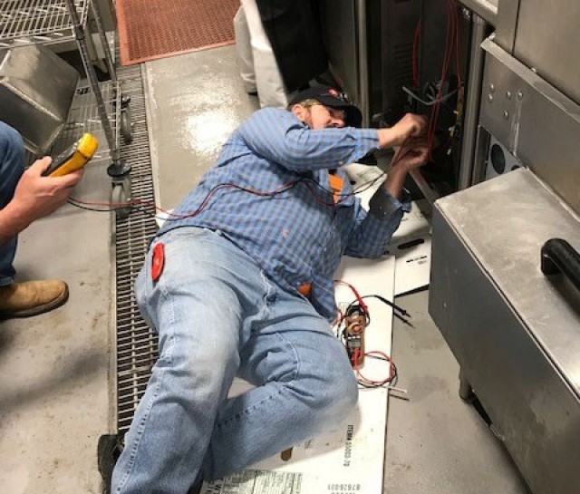 An EAGLE Fort Leonard Wood contractor provides maintenance on kitchen equipment. (Courtesy photo)
