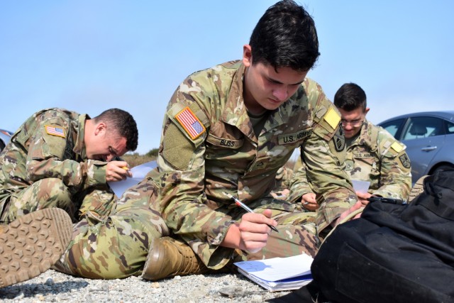 Pfc. Aaron Bliss, assigned to Company C, 229th Military Intelligence Battalion, takes a written exam during a battalion-level land navigation competition at Fort Ord National Monument, Calif., Aug. 7, 2021.