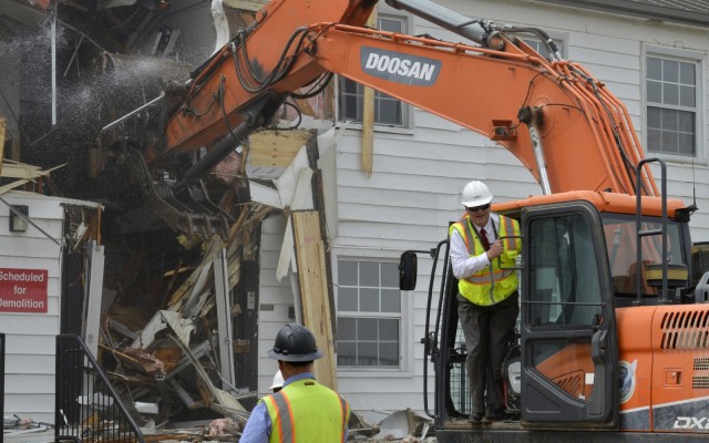 Patrick Appelman, former director of Fort Campbell’s Directorate of Public Works, assists in the demolition of a World War II-era wooden structure as part of an ongoing campaign to remove the aging buildings. In fiscal year 2020, DPW demolished...