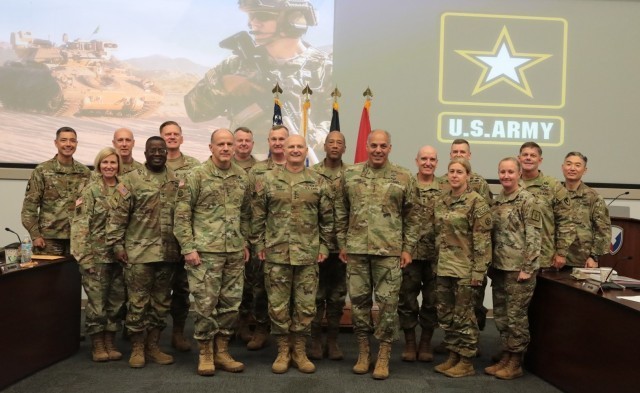 During the Army Sustainment Leader Summit at Army Materiel Command Headquarters, Redstone Arsenal, Ala., AMC commander Gen. Ed Daly, center, inducted two of the Army’s leading logistics and sustainment officers into the AMC Hall of Fame. With...