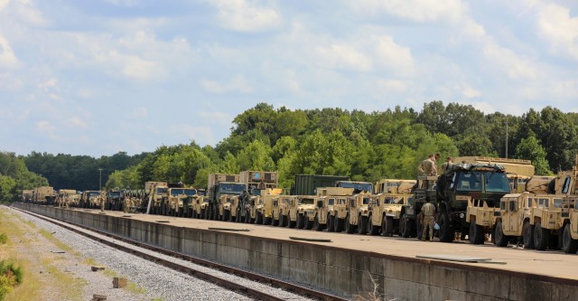 Soldiers assigned to 3rd Brigade Combat Team, 101st Airborne Division (Air Assault) stage their vehicles onto the Fort Campbell Railhead August 10th as they prepare to ship them out to Port Charleston, S.C. for their Sea Emergency Deployment...