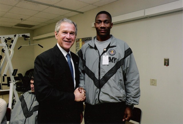 During his rehabilitation from wounds suffered in support of Operation Iraqi Freedom in 2005, Master Sgt. Harry Willis III was visited by President George W. Bush at Brooke Army Medical Center on Fort Sam Houston, Texas. Willis is now the Transportation Operations Branch NCOIC at Distribution Management Center, 19th Expeditionary Sustainment Command.

Courtesy photo