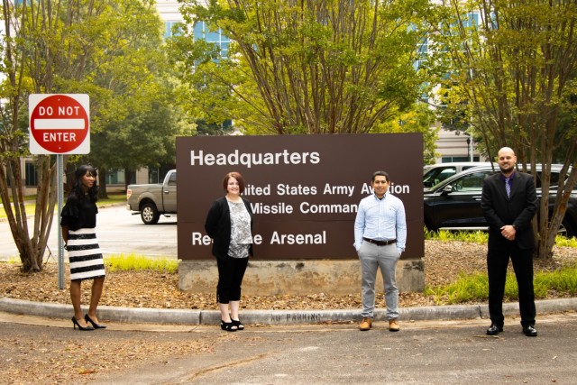 (Left to right) Marsha Cuffee, Monica Childers, Daniel Nguyen and Brian Dempsey, U.S. Army Aviation and Missile Command G-8 Command Accountability and Execution Review team, pose for a photo Aug. 12 at Redstone Arsenal, Ala. The group earned the Army Excellence in Financial Stewardship Award for the third quarter of fiscal year 2021.