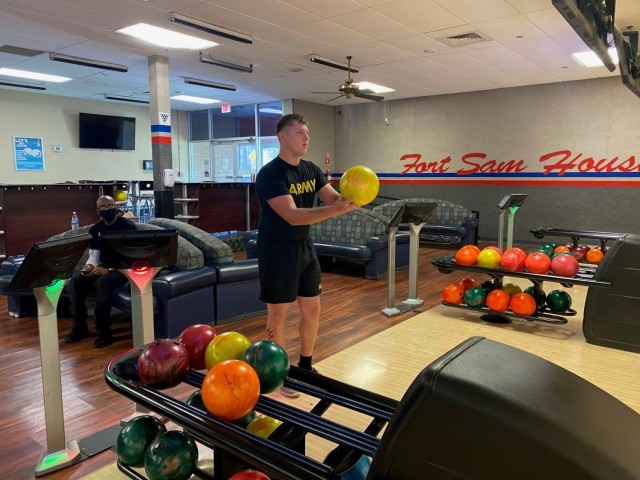 On July 14, Staff Sgt. Freddie Gardner (left) and Spc. Christian Sullivan (center) attended an adaptive reconditioning bowling event at the Fort Sam Houston Bowling Center. The Soldiers are assigned to the Joint Base San Antonio-Fort Sam Houston...
