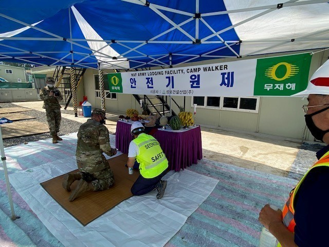 Col. Christopher Crary, U.S. Army Corps of Engineers Far East District commander, participated in a traditional shamanistic Korean safety prayer ceremony during the groundbreaking ceremony for the new Camp Walker Lodge, Aug.11. The safety ceremony...