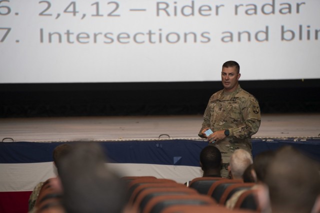 Motorcycle mentor Sgt. 1st. Class Michael Hartz, a senior drill sergeant with 4th Battalion, 39th Infantry Regiment, gives post riders tips on how to be safe during an event at the Post Theater Aug. 6.