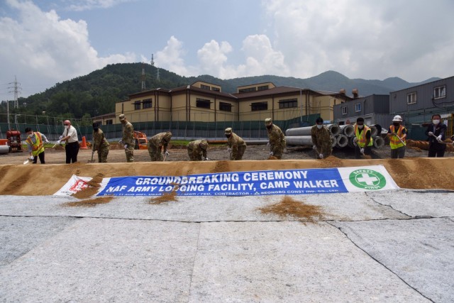 Col. Christopher Crary (fifth from right), U.S. Army Corps of Engineers Far East District commander, broke ground for the lodging facility at Camp Walker, Aug. 11, along with Brig. Gen. Steven L. Allen, 19th Expeditionary Sustainment Command...