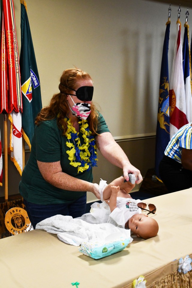 Jamie Murithi participated and won the diaper changing race game. Contestants had to see who could clean and change a dirty diaper on their baby doll the fastest, while blindfolded