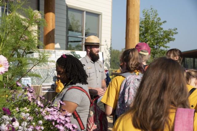 Justin Kerwin, senior park ranger with the U.S. Army Corps of Engineers – Alaska District, welcomes students on Aug. 5 to the Chena River Lakes Flood Control Project near North Pole, Alaska. The 125 children participated in eight STEM stations...