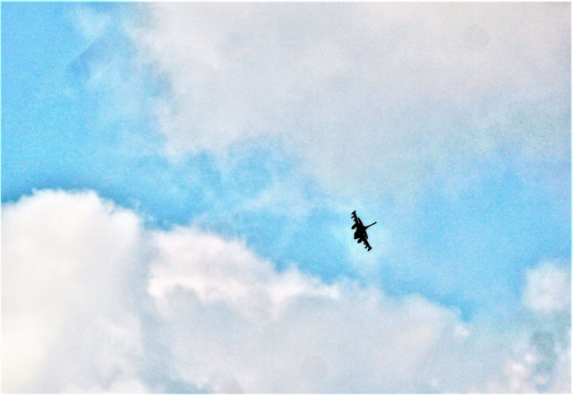 An Air Force F-16 Fighting Falcon flies over Fort McCoy, Wis., on Aug. 9, 2021. The fighter jet was participating in the Northern Lightning 2021 exercise at nearby Volk Field, Wis. Volk Field Combat Readiness Training Center was hosting...