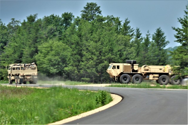 Soldiers at Fort McCoy, Wis., for training in the mobilization exercise Pershing Strike ’21 conduct operations July 22, 2021, at Fort McCoy, Wis. During the exercise, troops were able to access and use the Mission Command Configuration Center as...