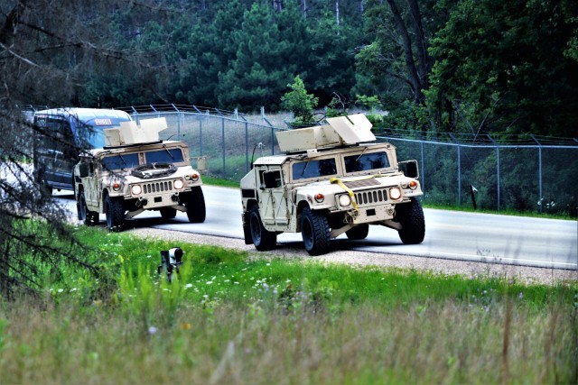 Soldiers at Fort McCoy, Wis., for training in the mobilization exercise Pershing Strike ’21 conduct operations July 22, 2021, at Fort McCoy, Wis. During the exercise, troops were able to access and use the Mission Command Configuration Center as...