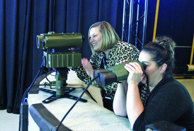 Leadership Fort Sill classmates Katrina Wetselline and Suzanne Parrish observe targets Jan. 24, 2020, in the Call for Fires trainers at Jared Monti Hall.