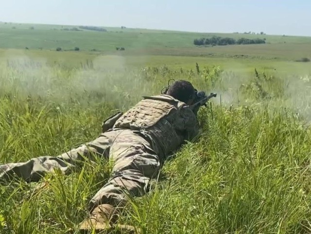 Pfc. Trevor S. Madden from Sonora, California, fires an M107 sniper rifle during standoff munitions disruption training on Fort Riley, Kansas, July 27.  Soldiers from the 774th Ordnance Company (Explosive Ordnance Disposal) trained with the sniper rifle to target and eliminate explosives at a distance.  U.S. Army photo by Sgt. Joshua S. Oh, 1st Infantry Division Public Affairs.