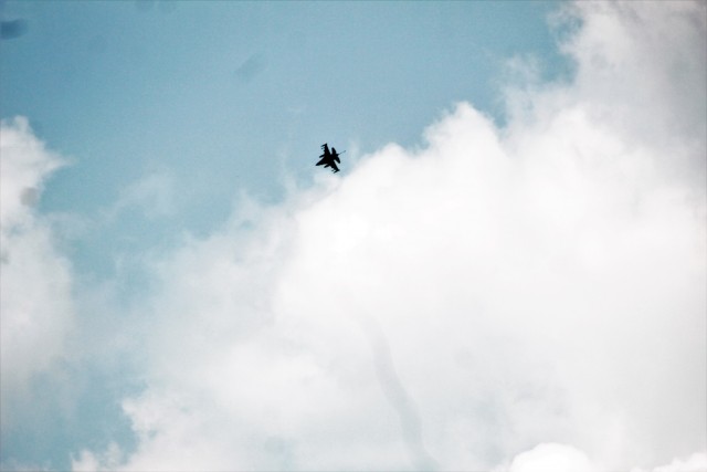 An Air Force F-16 Fighting Falcon flies over Fort McCoy, Wis., on Aug. 9, 2021. The fighter jet was participating in the Northern Lightning 2021 exercise at nearby Volk Field, Wis. Volk Field Combat Readiness Training Center was hosting...