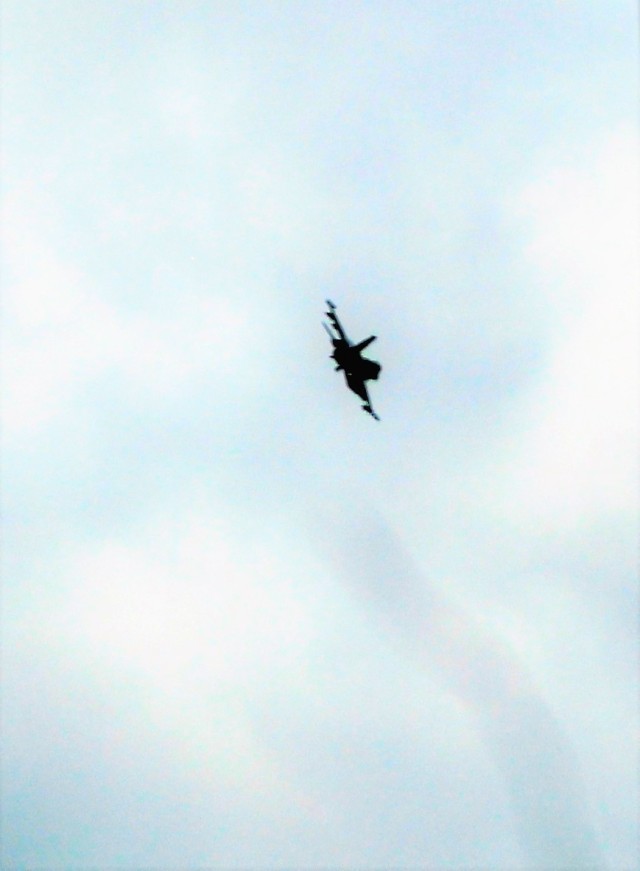 An Air Force F-16 Fighting Falcon flies over Fort McCoy, Wis., on Aug. 9, 2021. The fighter jet was participating in the Northern Lightning 2021 exercise at nearby Volk Field, Wis. Volk Field Combat Readiness Training Center was hosting...