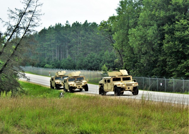 Soldiers at Fort McCoy, Wis., for training in the mobilization exercise Pershing Strike ’21 conduct operations July 22, 2021, at Fort McCoy, Wis. During the exercise, troops were able to access and use the Mission Command Configuration Center as...