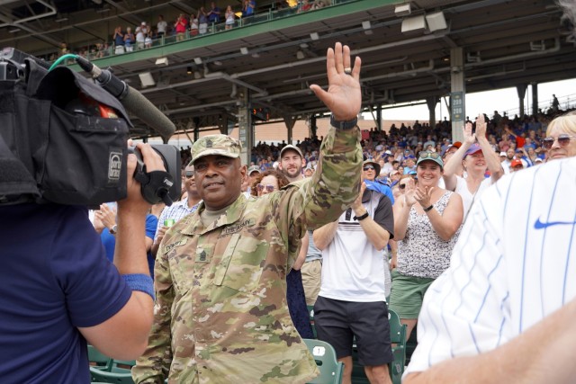 U.S. Army Reserve Command Sgt. Maj Theodore Dewitt is honored for his service during a Chicago Cubs home game, at Wrigley Field in Chicago, August 12, 2021. Dewitt was recognized during the game for his 36 years of service in the Army to include deployments to Kuwait, Iraq and Afghanistan. 
(U.S. Army Reserve photo by Capt. Michael J. Ariola)
