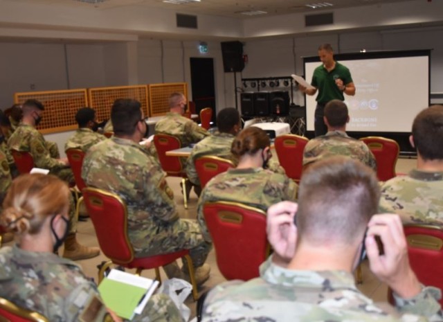 Lt. Col. Miguel Flores, Commander 405th Army Field
Support Battalion, Africa shares his personal international experience with young Servicemembers  during a multicultural development seminar held at Camp Darby in July.
