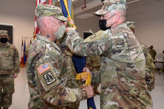 Incoming Command Sgt. Maj. Steven J. Slee, left, receives the colors from Brig. Gen. Ernest Litynski, Commanding General, 85th U.S. Army Reserve Support Command. Slee assumed command of the 85th USARSC, August 14, 2021. ...
