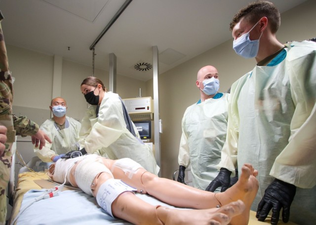 Cadet Teresa Novoa (second from left), a Stockton, California native and student at California State University, Fresno, performs CPR on a simulated casualty during a training exercise at the Intensive Care Unit at Landstuhl Regional Medical Center, Aug. 12.