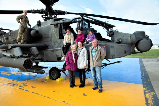 Former local national employee Marie Steiger and her family visited USAG Ansbach 26 years after retiring from a 45-year-career with the U.S. Army. 
During their visit they were treated to a private helicopter tour by 12th Combat Aviation Brigade personnel. (Photo by Georgios Moumoulidis, 7ATC-TSAE)