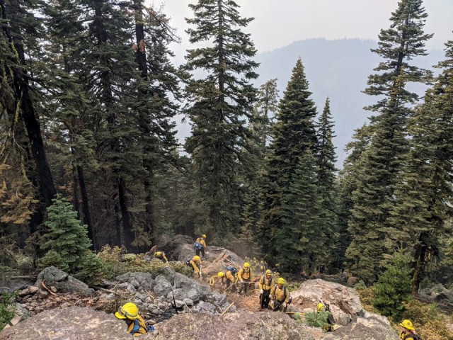 Service members with California National Guard’s Joint Task Force 578 fight the Dixie Fire as part of the mutual aid system in support of CAL FIRE, Aug. 16, 2021, in Northern California.
