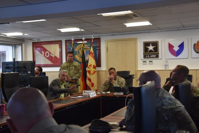 Col. Mario Washington, Wiesbaden Garrison commander, listens to input from Garrison directorate members during the Garrison tabletop exercise on a COVID outbreak at the Wiesbaden schools.