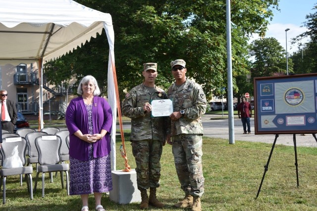 Command Sgt. Maj. Chris Truchon was awarded a Legion of Merit award from Col. Mario Washington, Wiesbaden Garrison Commander, prior to the Garrison's Change of Responsibility ceremony Aug. 20  on Clay Kaserne.