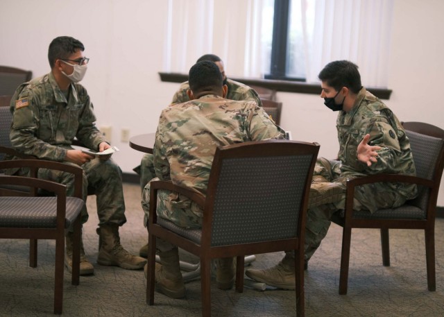 Soldiers discuss how to react to offensive gestures during annual SHARP training