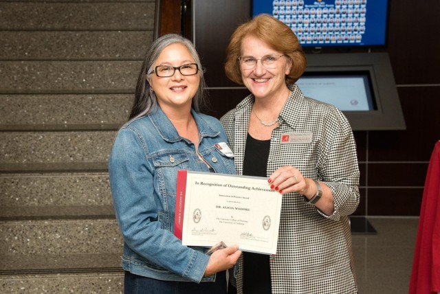 Dr. (Col.) Alicia Madore is pictured with Dr. Suzanne S. Prevost, PhD, RN, FAAN, Dean, Capstone College of Nursing at the University of Alabama, accepting the ‘Innovation in Practice’ Award, on July 30, 2021, for the project titled “Nurse-Led Clinic eHealth Care Coordination for Sexually Transmitted Infections.”