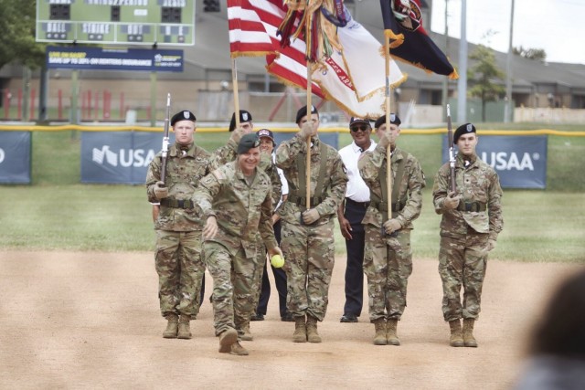 Colonel Andrew Q. Jordan, Fort Campbell garrison commander, throws the first pitch Aug. 13 during the 2021 Armed Forces Women's Softball Championship game at Fort Campbell.