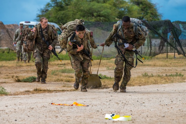 U.S. Army Staff Sgt. James Gabisum, and Sgt. Brenden Lopez, from Regional Health Command Europe, drag a skedco during the U.S. Army Medical Command (MEDCOM) 2021 Best Leader Competition, July 29, 2021, at Hickam Beach, Hawaii. The 2021 MEDCOM Best...
