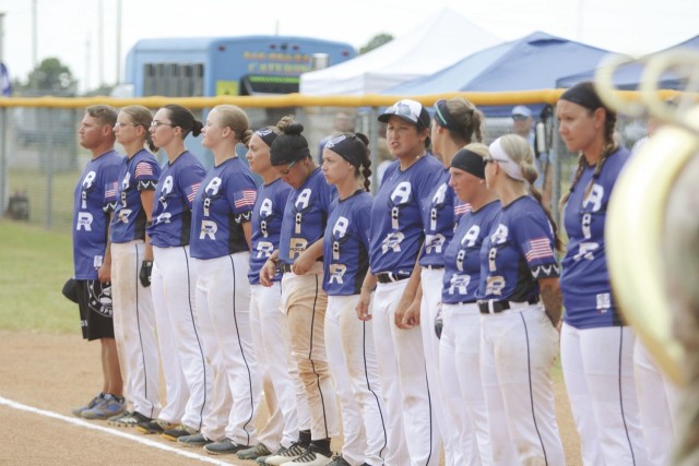 The Air Force Women’s Softball Team lines up Aug. 13 before the final Armed Forces Women’s Softball Championship tournament game to compete against Navy at the South Softball Complex. Navy ended the game with 20 runs and Air Force finished at...