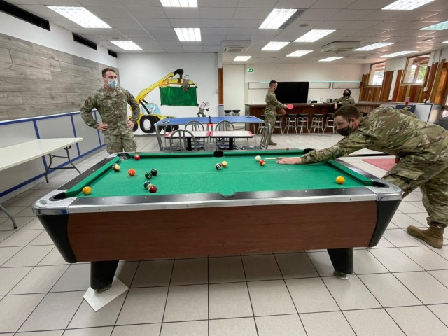 Camp Darby single service members craft their own recreation room