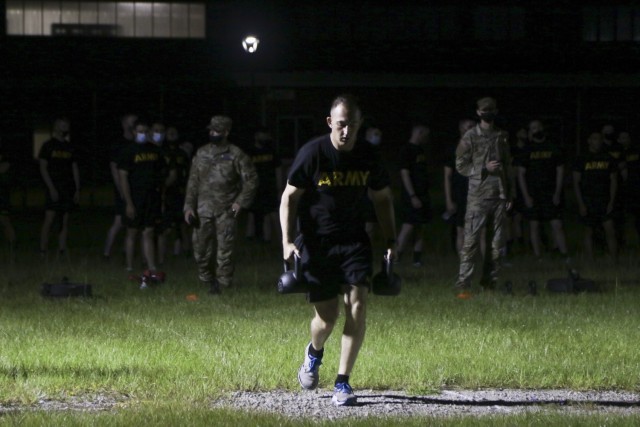 Soldiers conduct the sprint-drag-carry portion of the Physical Fitness Assessment for Expert Soldier Badge candidates at Fort Stewart, Georgia, Aug. 16, 2021. Candidates have to pass all portions of the physical assessment to continue the ESB testing for four more days.  (U.S. Army photo by Pvt. Elsi Delgado)