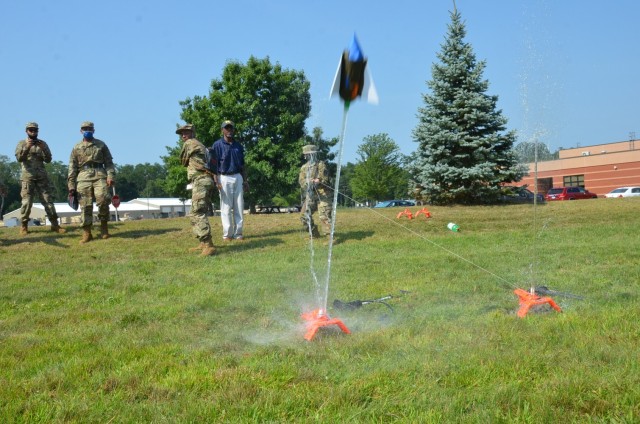 DoD STEM K-12 Physics Teacher Grayling Mercer oversees JROTC cadets launch their water rockets during a STEM Day camp Aug. 5 at Fort Custer, Mich. (U.S Army photo by Jerome Aliotta) 