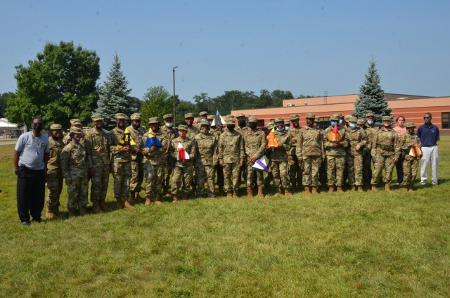 U.S. Army Ground Vehicle Systems Center DoD STEM Coordinator & HBCU/MI Liaison Officer Greg Chappelle, left, and DoD STEM K-12 mathematics teacher Nicole Ames-Powell, third from right, and DoD STEM K-12 physics teacher Grayling Mercer, far right, with JROTC cadets at a STEM Day camp Aug. 5 at Fort Custer, Mich. (U.S Army photo by Jerome Aliotta)