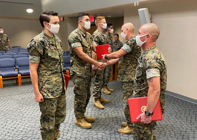During a ceremony Aug. 26 at Specker Chapel, Col. Charles Long, Fort Leonard Wood Marine Corps Detachment commander, recognized key players in the unit&#39;s recent Commanding General’s Readiness Inspection, held Aug. 17 to 19 here .