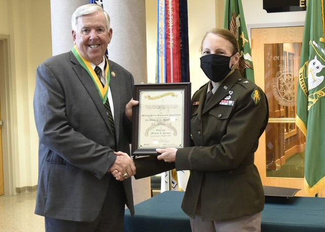 Missouri Governor Mike Parson was honored with the Order of the Marechaussee in steel by Brig. Gen. Niave Knell, U.S. Army Military Police School commandant, for his service in the Army as an MP.