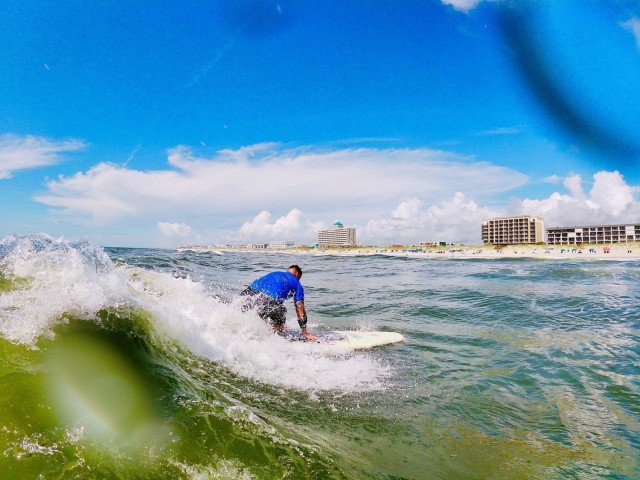 Master Sgt. Ryan Serraro, a Soldier assigned to the Fort Bragg Soldier Recovery Unit, North Carolina, rode a wave at Carolina Beach on July 15 as part of an adaptive surfing event. (Photo courtesy of Lee Whitford)