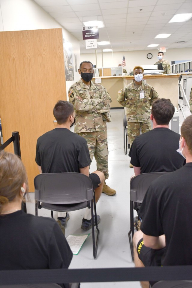 Maj. Gen. Jonathan Woodson, commanding general, Army Reserve Medical Command, speaks with cadets while touring the Soldier Readiness Processing site for the 2021 Cadet Summer Training on Monday, July 12. The SRP site is a part of the ARMEDCOM medical support offered annually to the Fort Knox, Ky. training exercise, and ensures cadets are medically safe to train in the exercise and ready for commissioning. The CST is the largest annual training exercise executed by the U.S. Army, graduating almost 10,000 Cadets from Advanced Camp or Basic Camp each summer. More than 250 ARMEDCOM Soldiers have provided support to the exercise, including medics, physicians, x-ray technicians, pharmacy technicians and lab technicians.