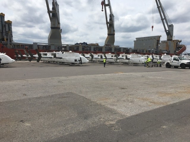 Thirty-six aircraft wait to be loaded onto the transport ship at the port in Jacksonville, Florida. (Photo by John Zimmerman, Army Futures Command)