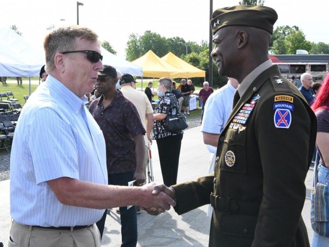Maj. Gen. Milford H. Beagle Jr., 10th Mountain Division (LI) and Fort Drum commander, speaks with attendees during the 2021 Retiree Appreciation Day opening ceremony Aug. 28 outside Clark Hall.  (Photo by Mike Strasser, Fort Drum Garrison Public...