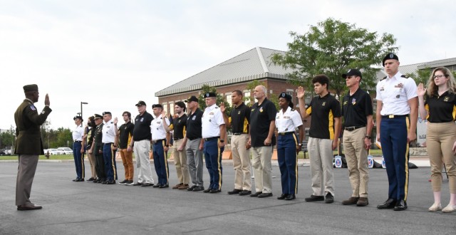 Maj. Gen. Milford H. Beagle Jr., 10th Mountain Division (LI) and Fort Drum commander, administers the oath of enlistment for future Soldiers during the 2021 Retiree Appreciation Day opening ceremony Aug. 28 outside Clark Hall.  (Photo by Mike...