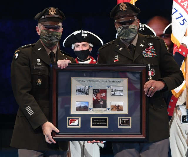 U.S. Army Chief of Staff Gen. James McConville, left, presents a retirement plaque to Lt. Gen. Leslie C. Smith, the 66th Inspector General of the Army, during Smith’s retirement ceremony at Conmy Hall, Joint Base Myer-Henderson Hall, Virginia,...