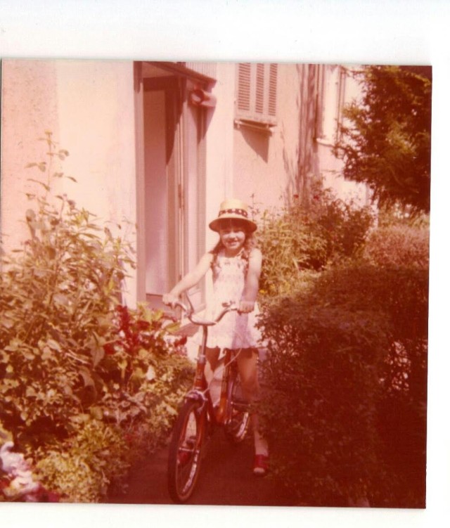 Natalie Clarke-Knight rides her bike as a young girl in Schwäbisch Gmünd.